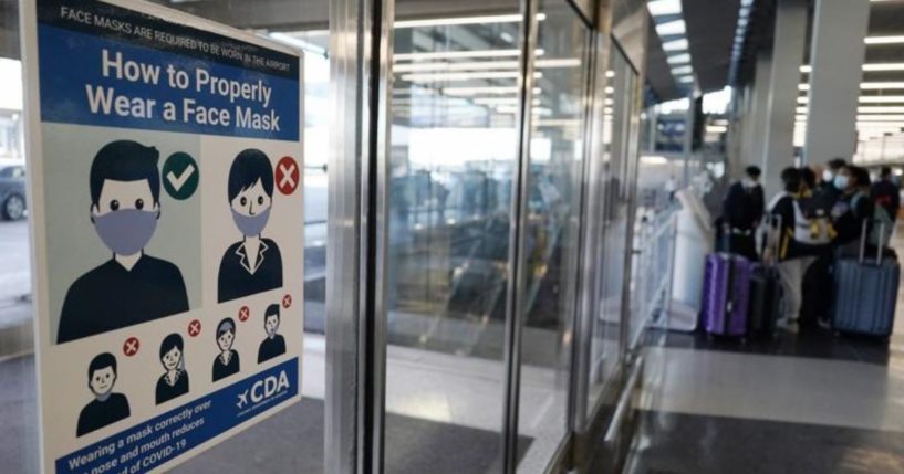 A sign telling people to wear masks at O’Hare International Airport in Chicago is seen in a photo taken on July 2, 2021.