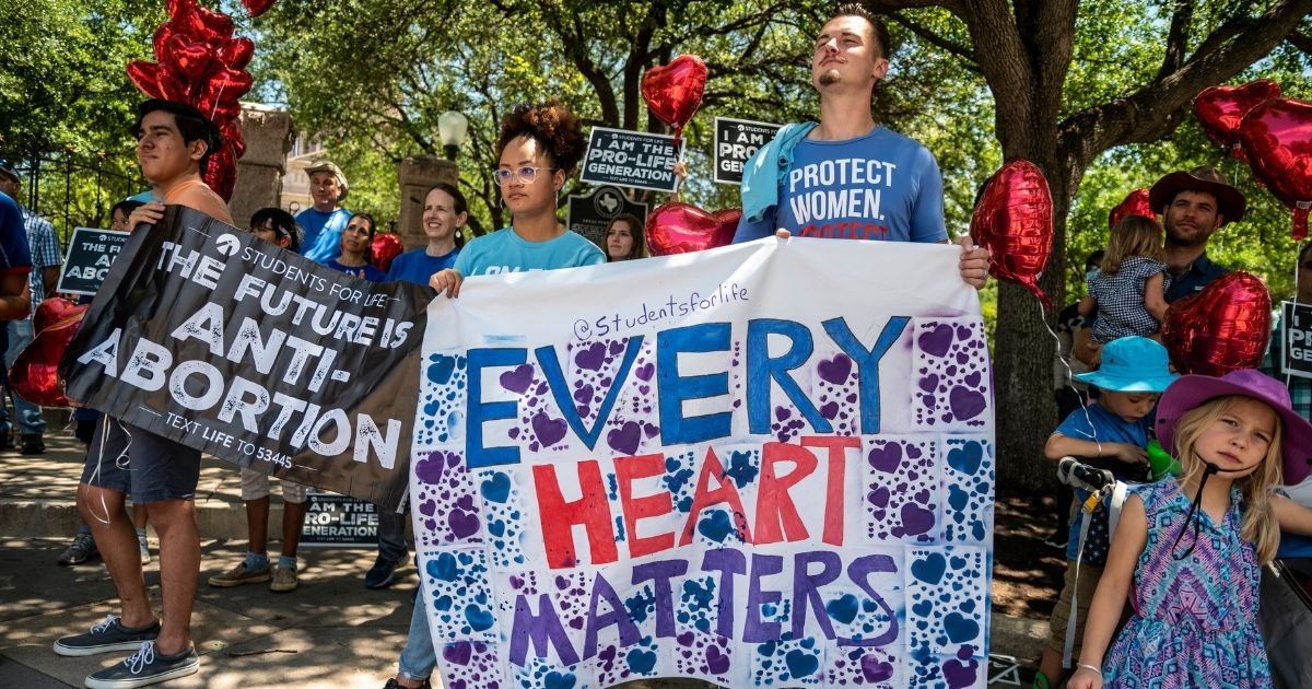 Students for Life members rally in favor of the abortion law in Austin, Texas, on May 29, 2021.