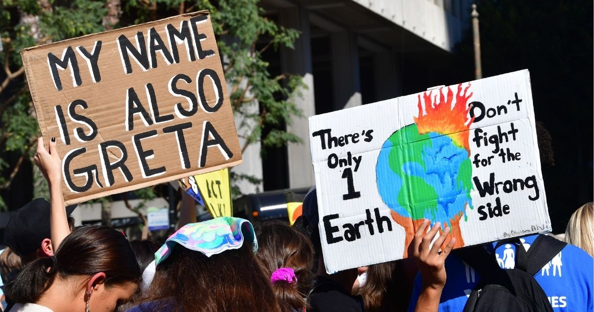 A group of climate change activists are seen marching through Los Angeles in a photo taken on Nov. 1, 2019.