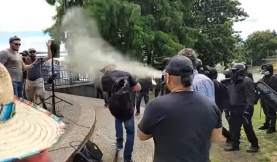 Antifa thugs captured on video attacking an outdoor prayer gathering in Portland, Oregon, on Saturday.