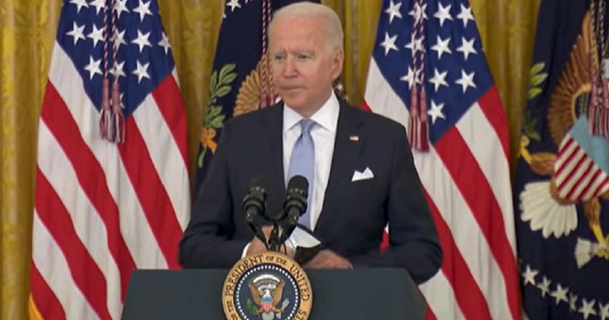 President Joe Biden addresses the media Thursday in the East Room of the White House.