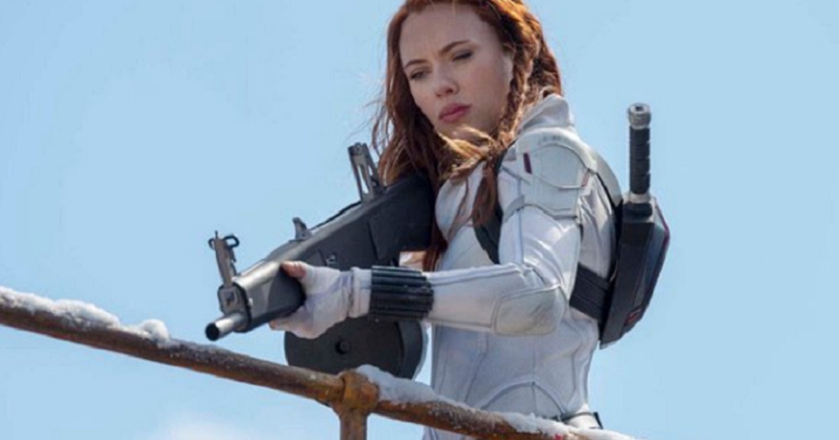 Actress Scarlett Johansson points a weapon in the movie "Black Widow."