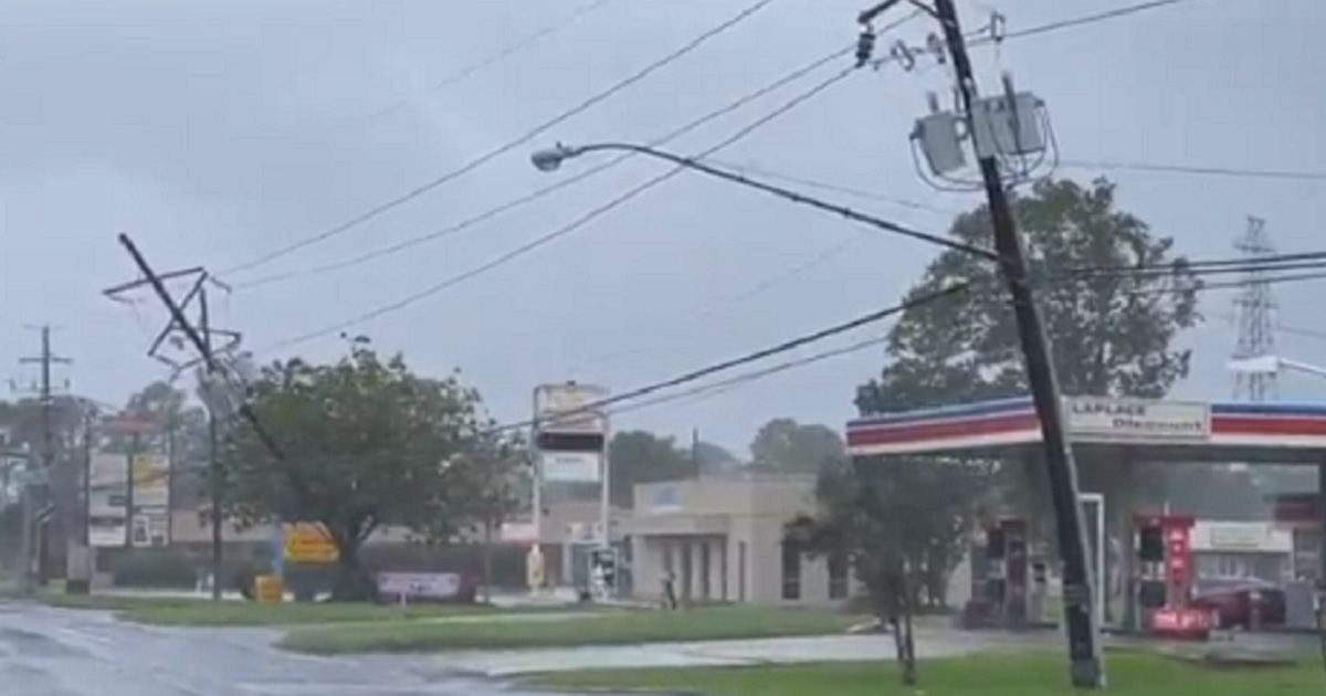 Power lines buckle as Hurricane Ida makes landfall Sunday in Louisiana.