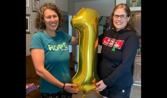 Brittany Clark, left, who donated her kidney, is pictured with Kim Shufelberger, who has kidney disease and received Clark's kidney, the day before the transplant surgery.