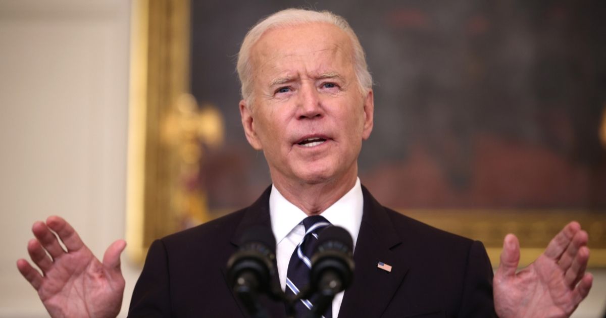 President Joe Biden speaks about combating the coronavirus pandemic in the State Dining Room of the White House on Thursday in Washington, D.C.