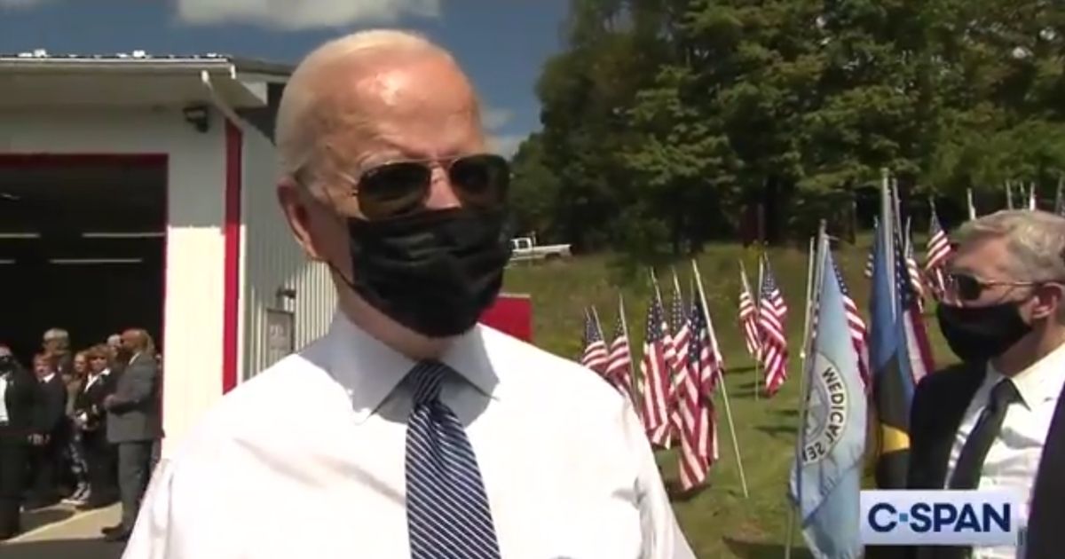President Joe Biden speaks at the memorial site of the United Flight 93 plane crash in Pennsylvania on Saturday.