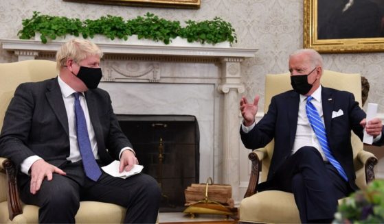 U.S. President Joe Biden, right, holds a bilateral meeting with Britain's Prime Minister Boris Johnson at the Oval Office of the White House in Washington, D.C., on Tuesday.