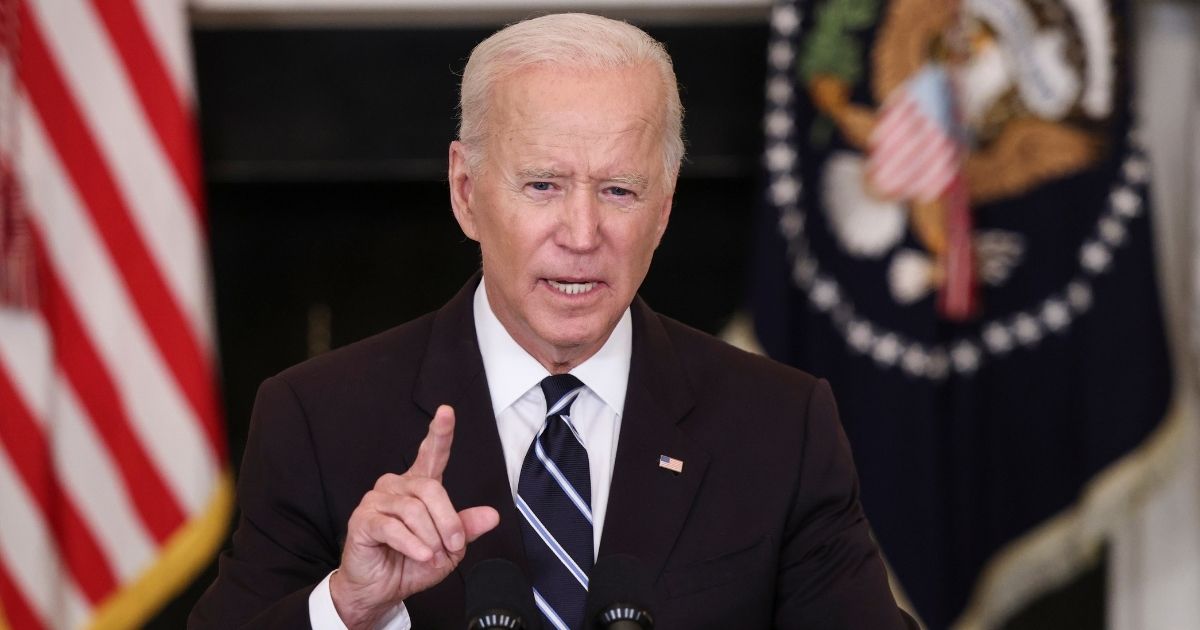 President Joe Biden speaks about his new orders to fight the coronavirus pandemic in the State Dining Room of the White House in Washington on Thursday.