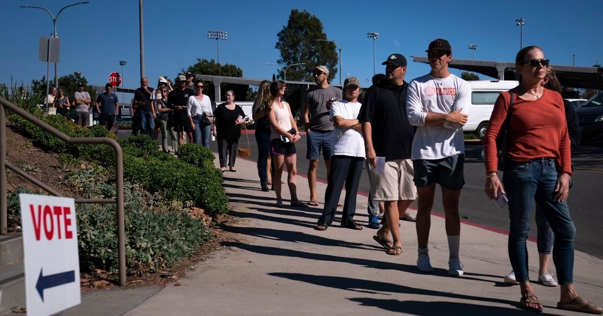 Californians wait in line to cast their recall ballots in Huntington Beach, Calif., in this file photo from Sept. 14, 2021.