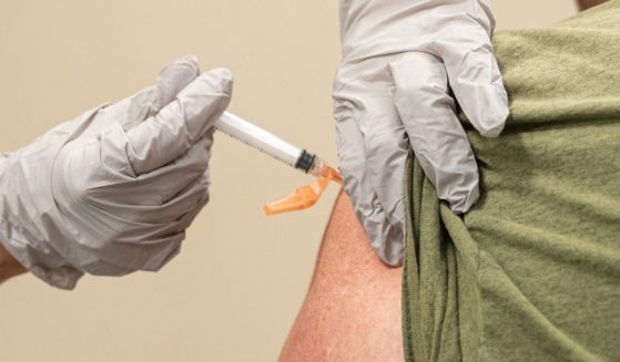 A civilian contractor receives his COVID-19 vaccine from Preventative Medicine Services on Sept. 9, 2021, in Fort Knox, Kentucky.