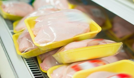 Packaged chicken breasts are pictured at a grocery store in the stock image above.
