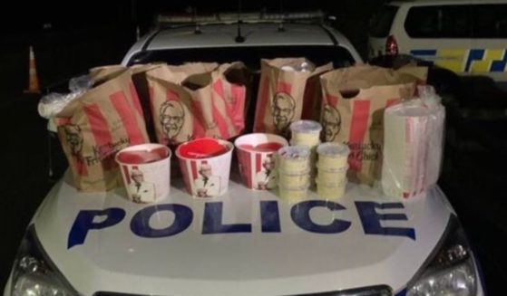 Two men in New Zealand attempted to smuggle Kentucky Fried Chicken into the locked-down city of Auckland.