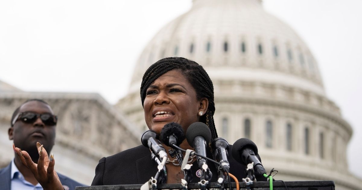 Democrat Rep. Cori Bush of Missouri, seen here addressing a crowd on the Capitol steps on Sept. 21, 2021, was one of several congresswomen who spoke out about their abortion experiences Thursday in Washington, D.C.