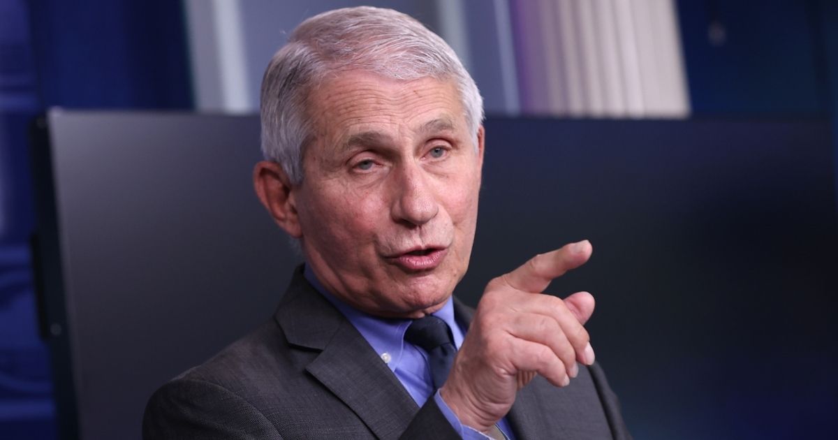 Dr. Anthony Fauci, director of the National Institute of Allergy and Infectious Diseases, talks to reporters in the Brady Press Briefing Room of the White House in Washington on April 13.