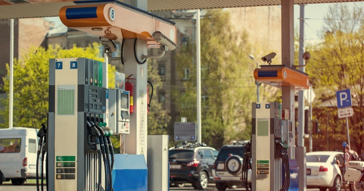 Gas station pumps are pictured in the stock image above.