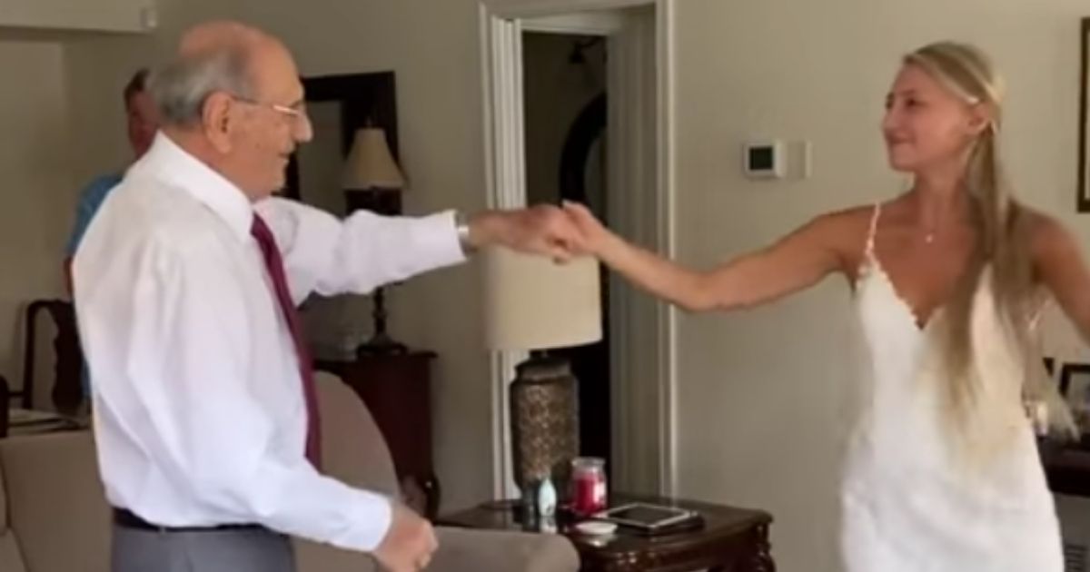 Natalie Browning flew 800 miles with her wedding dress to share a dance with her 94-year-old grandfather.