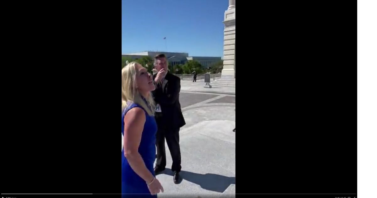 Georgia Rep. Marjorie Taylor Greene shouted her support for the unborn Friday as Democrats gathered on the Capitol steps to celebrate passage of a measure calling for unrestricted abortion up until birth.