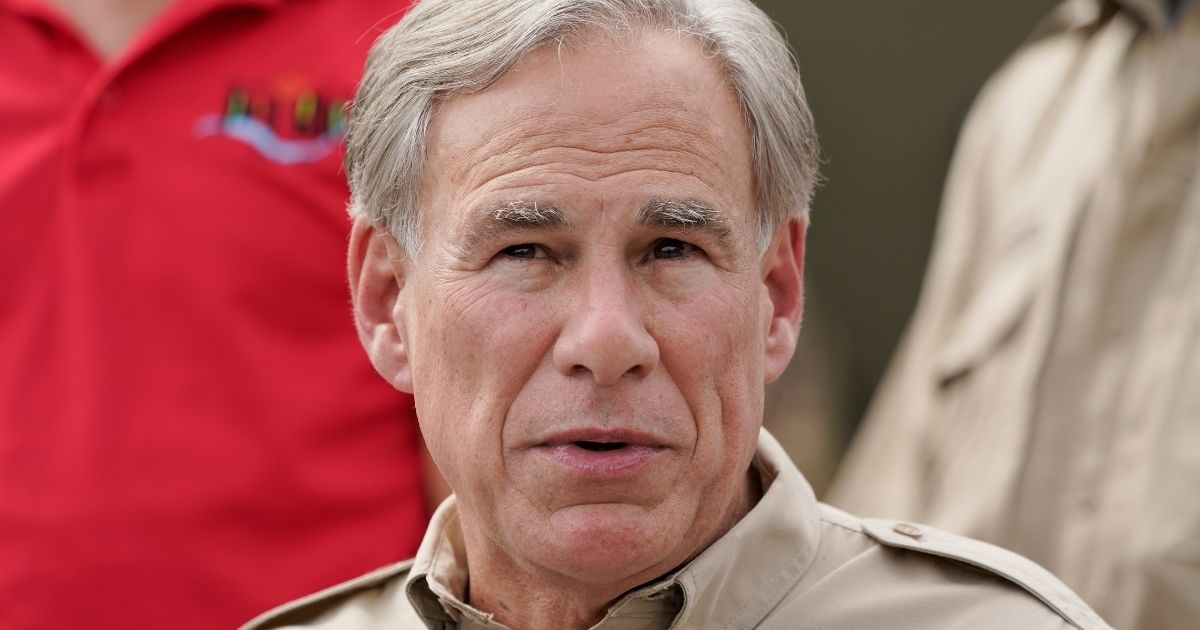 Texas Gov. Greg Abbott speaks during a news conference along the Rio Grande in Del Rio on Tuesday.