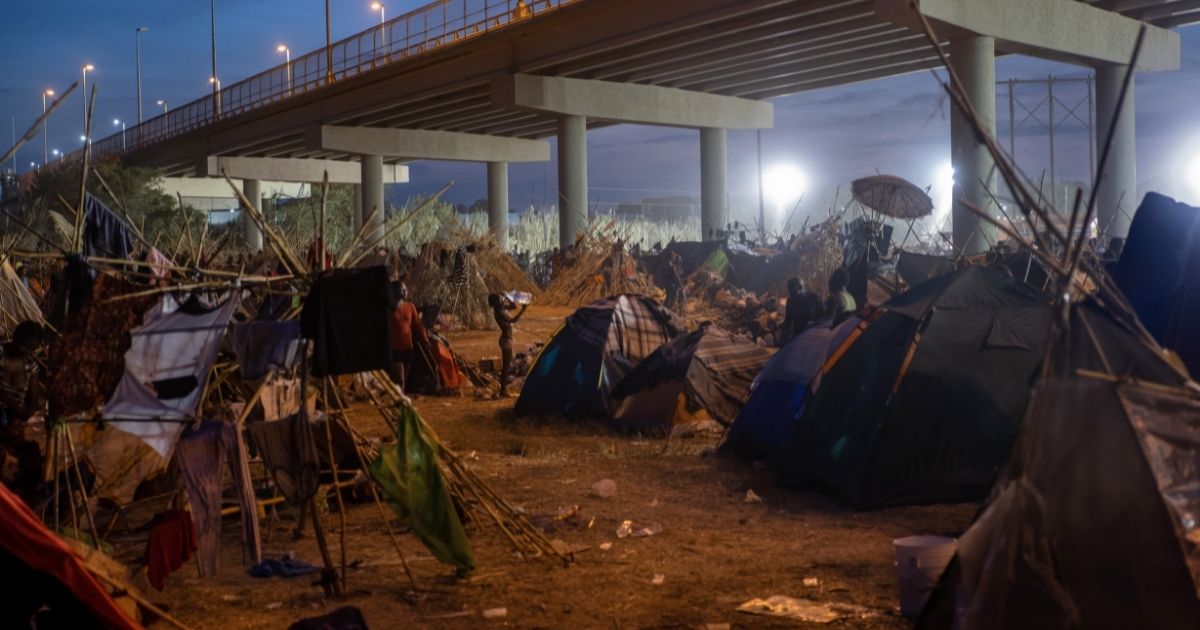 A migrant camp is pictured at the U.S.-Mexico border in Del Rio, Texas, on Tuesday.