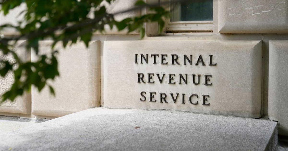 This May 4, 2021, photo shows a sign outside the Internal Revenue Service building in Washington, D.C.