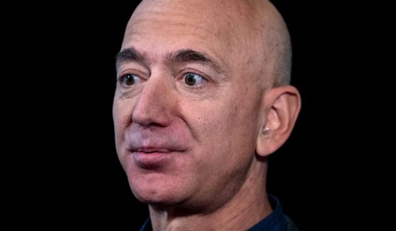 Amazon founder Jeff Bezos speaks to the media during an event in Washington on Sept. 19, 2019.