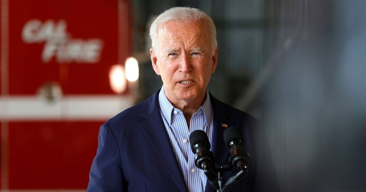 President Joe Biden delivers remarks to reporters after a helicopter tour with California Gov. Gavin Newsom on Monday in Mather, California.