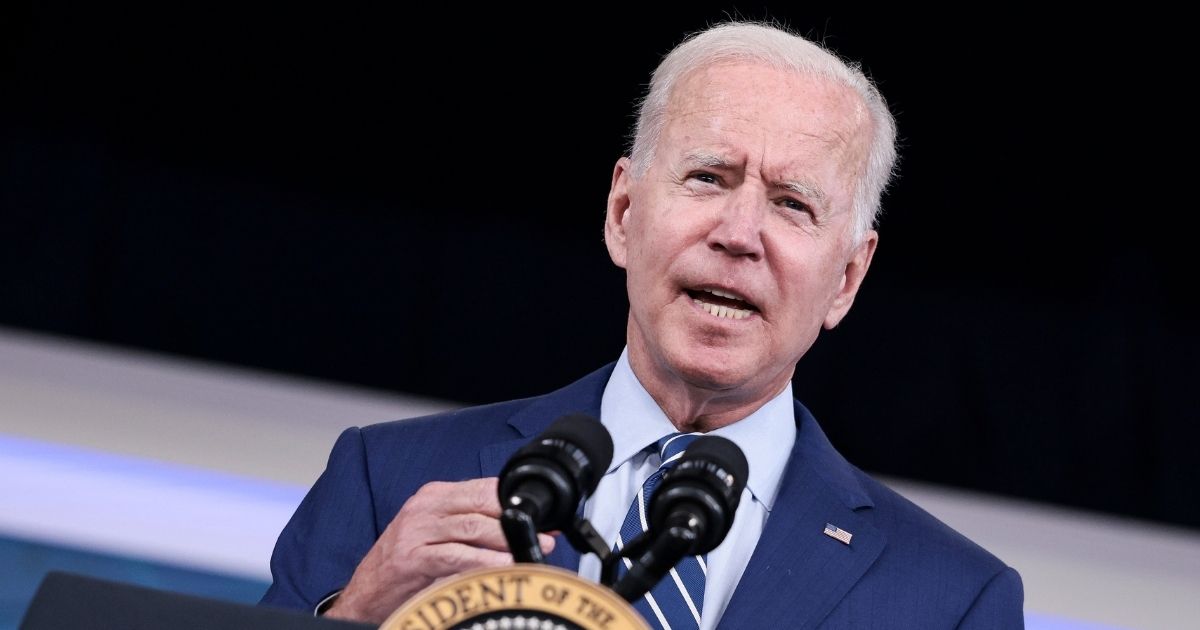 President Joe Biden delivers remarks ahead of receiving a third dose of the Pfizer-BioNTech COVID-19 vaccine in the South Court Auditorium in the White House in Washington, D.C., on Monday.