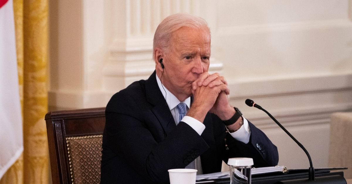 President Joe Biden listens during a Quad Leaders Summit in the East Room of the White House on Friday in Washington, D.C.