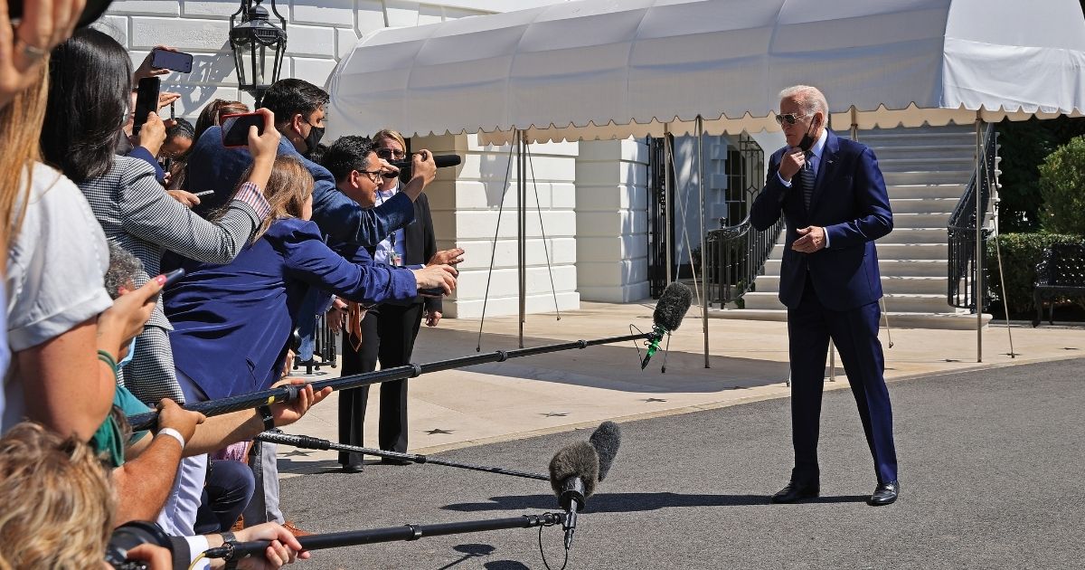 President Joe Biden talks briefly to reporters before boarding Marine One on the South Lawn of the White House on Sept. 3, 2021, in Washington, D.C.