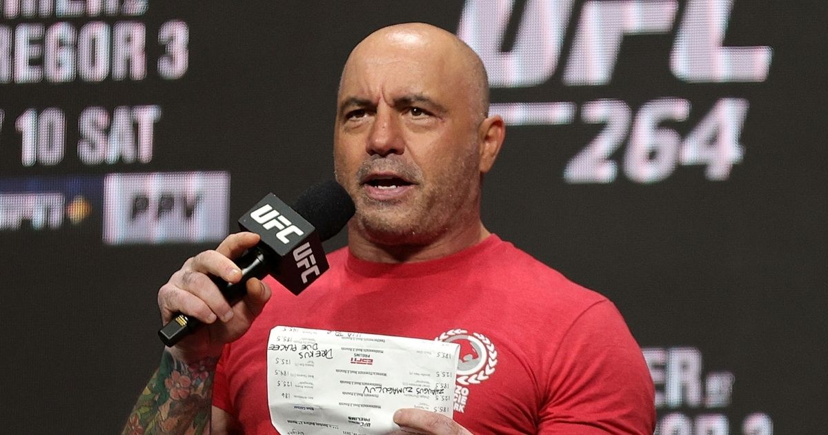 UFC commentator Joe Rogan announces the fighters during a ceremonial weigh in for UFC 264 at T-Mobile Arena on July 9, 2021 in Las Vegas, Nevada.