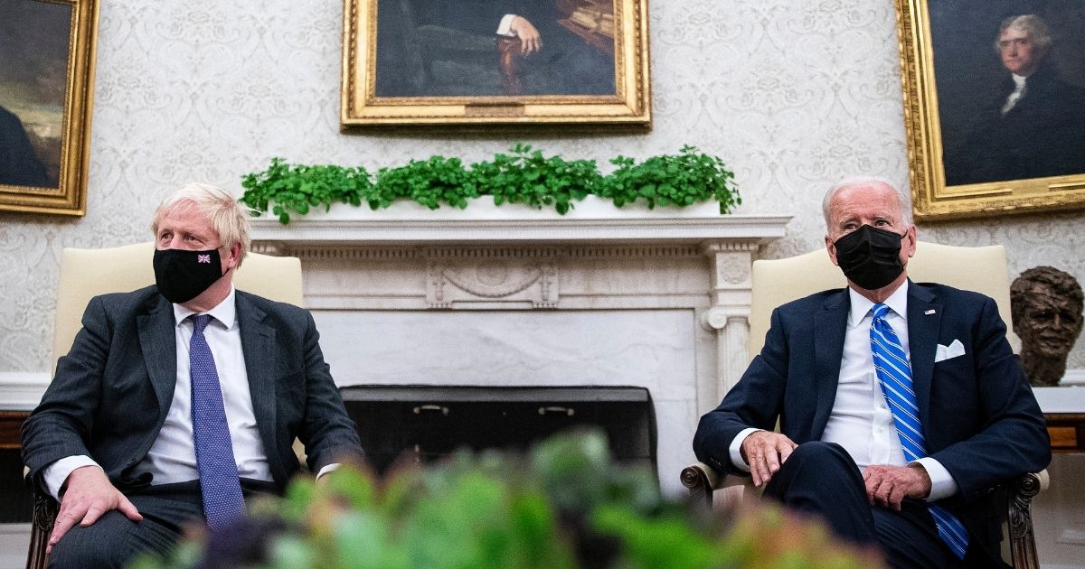British Prime Minister Boris Johnson, left, meets with President Joe Biden in the Oval Office of the White House in Washington on Tuesday.