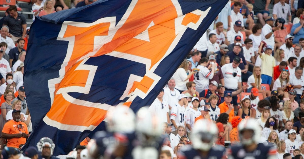 Cheerleaders wave the Auburn flag during the Tigers' game against the Akron Zips at Jordan-Hare Stadium in Auburn, Alabama, on Saturday.