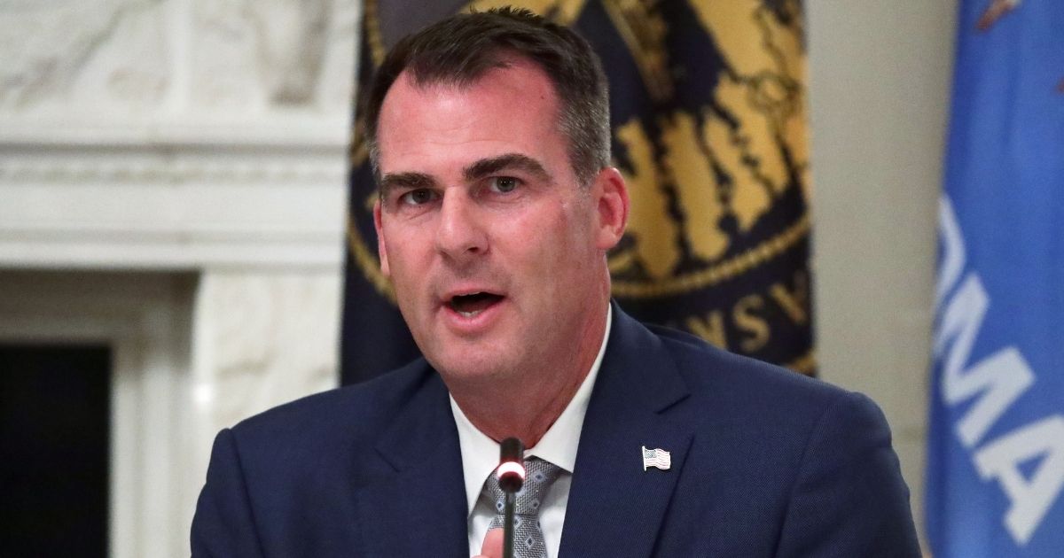 Republican Oklahoma Gov. Kevin Stitt speaks during a roundtable at the State Dining Room of the White House on June 18, 2020 in Washington, D.C.