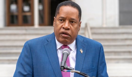 Conservative radio talk show host Larry Elder speaks to supporters during a campaign stop outside the Hall of Justice in downtown Los Angeles on Thursday.