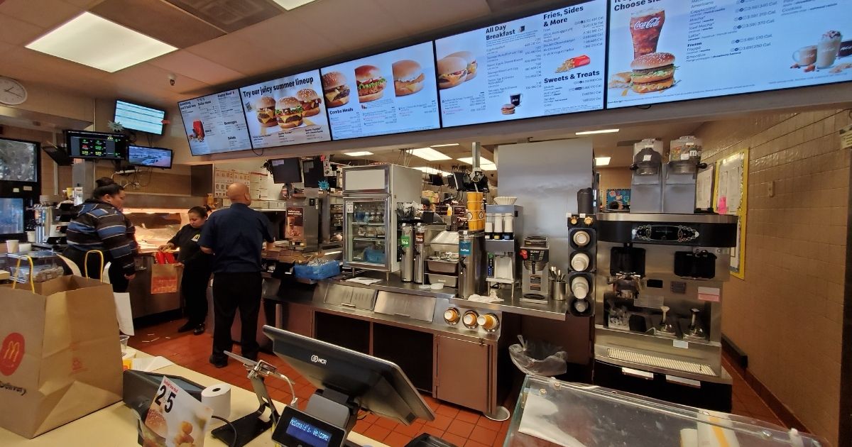 Counter area, kitchen and menus are visible in wide angle view in interior of McDonald's restaurant in San Ramon, California, Jan. 21, 2020.