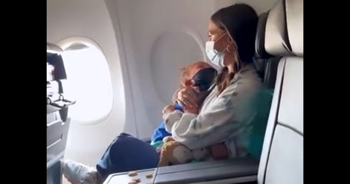 Amanda Pendarvis and her 2-year-old son, Waylon, are seen on their American Airlines flight.