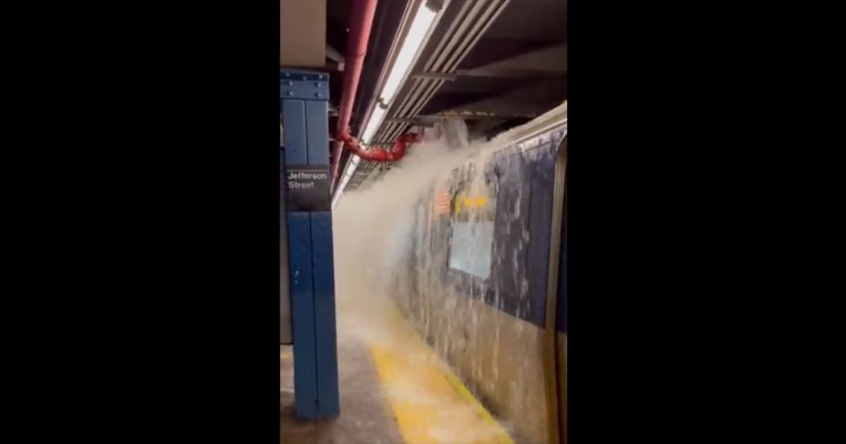 Videos taken by New York subway passengers on Wednesday showed water rushing into stations around the city.