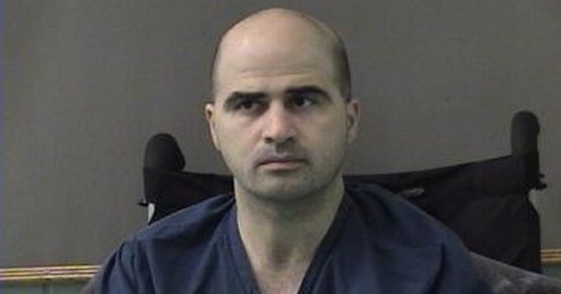 In this photo released by the Bell County Sheriff's Office, U.S. Maj. Nidal Hasan, the Army psychiatrist who was charged with murder in the Fort Hood shootings, is seen in a booking photo after being moved to the Bell County Jail on April 9, 2010, in Belton, Texas.