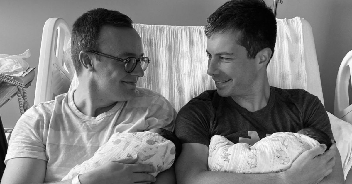 Transportation Secretary Pete Buttigieg, left, and his husband Chasten have adopted two newborns.
