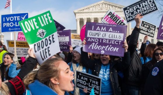 Anti-abortion activists rally outside the Supreme Court in Washington during the annual March for Life on Jan. 18, 2019.