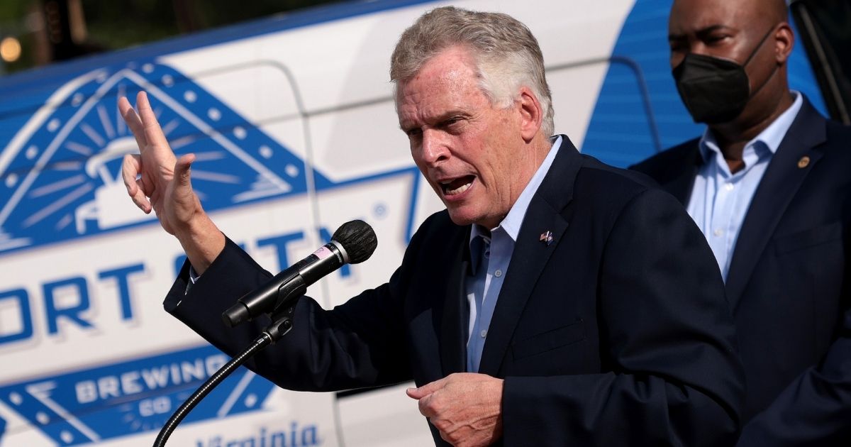 Former Virginia Gov. Terry McAuliffe campaigns for a second term during an event at the Port City Brewing Company on Aug. 12, 2021, in Alexandria, Virginia.