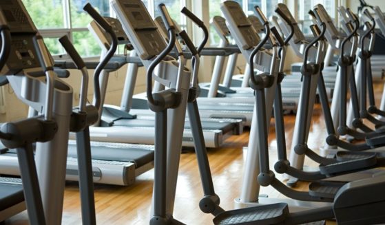 Rows of treadmills are pictured in the stock image above.