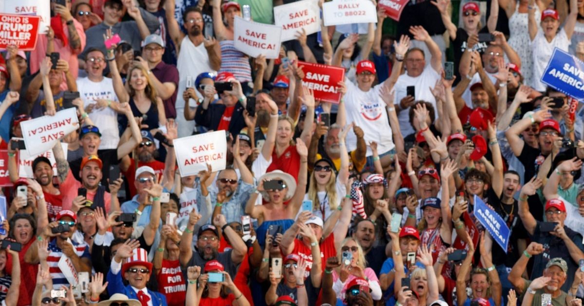 Supporters of former President Donald Trump cheer during his campaign-style rally in Wellington, Ohio, on June 26.