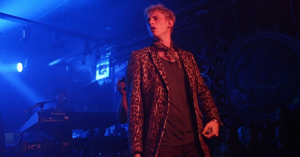Machine Gun Kelly is seen performing onstage at the John Varvatos x MGK Fashion Week Concert in New York City on Sept. 7, 2017. (