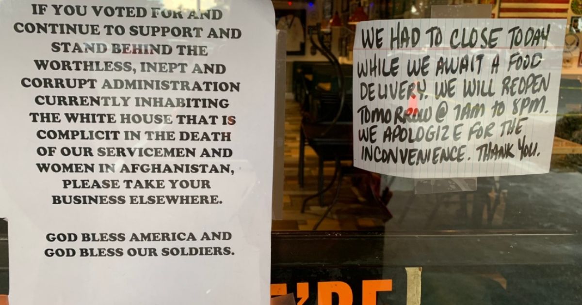 Angie Ugarte, who runs the DeBary Diner in DeBary, Florida, posted this sign on her front door when 13 U.S. service members were killed in Kabul as part of the withdrawal of American forces from Afghanistan.