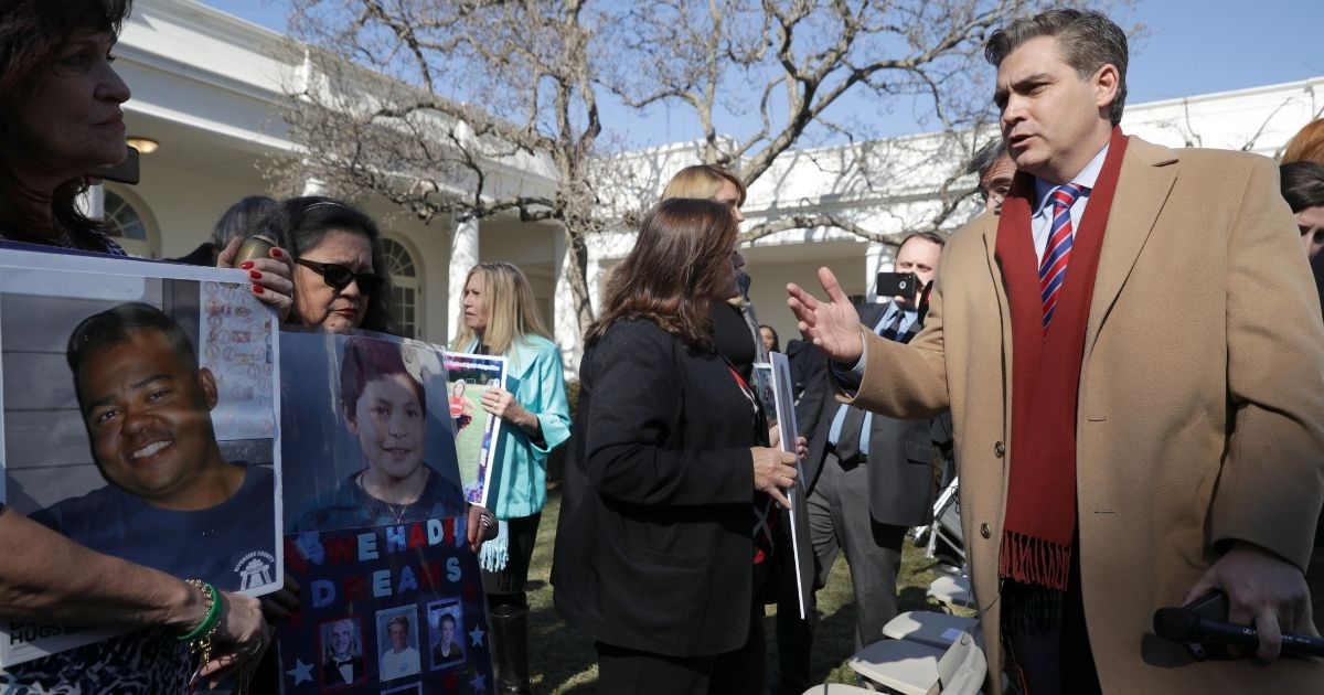 CNN's Jim Acosta speaks to relatives of victims killed by illegal immigrants after then-President Donald Trump spoke on border security on Feb. 15, 2019, in Washington, D.C.