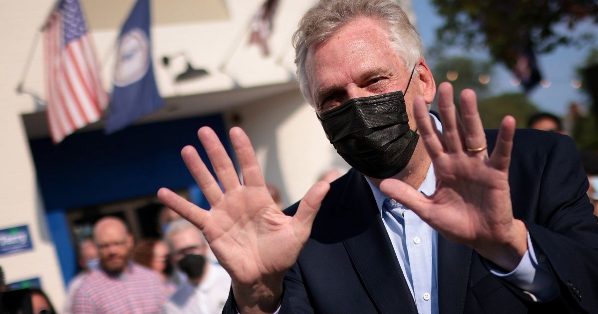 Terry McAuliffe is seen attending an event at the Port City Brewing Company in Alexandria, Virginia, on Aug. 12, 2021.