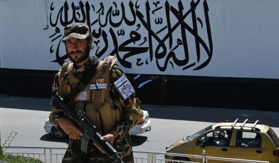 A Taliban special forces unit member is seen standing outside the US embassy in Afghanistan on Wednesday.