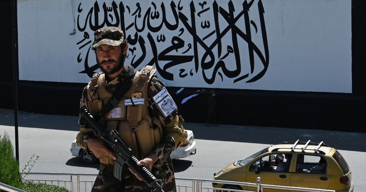 A Taliban special forces unit member is seen standing outside the US embassy in Afghanistan on Wednesday.