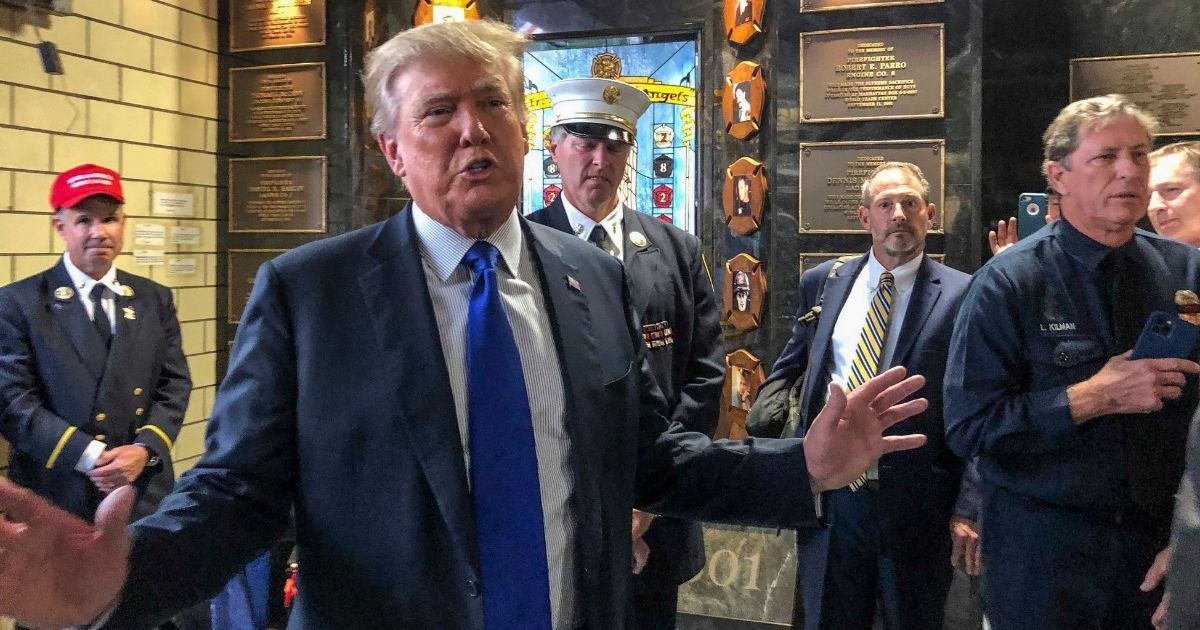 Former President Donald Trump visits the Engine Co. 8 firehouse in Manhattan on Saturday.